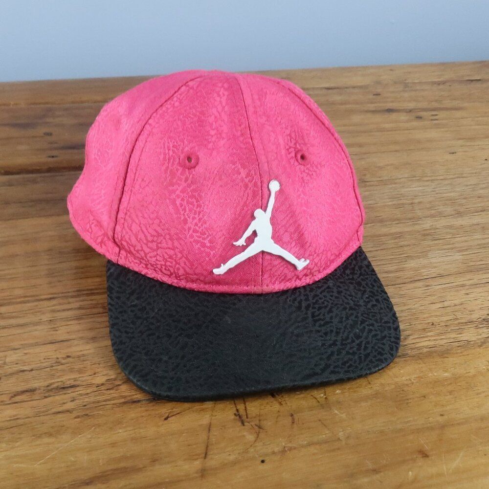 JORDAN JUMPMAN PINK & BLACK SNAPBACK INFANT BASEBALL CAP WITH WHITE METAL LOGO